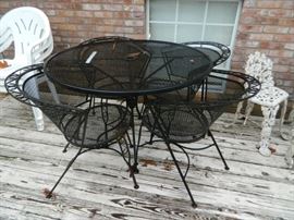 Roundbmetal patio set with 4 chairs