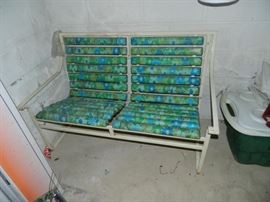 Attached garage to the home - metal vintage lawn furniture - settee