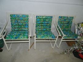 Attached garage to the home - metal vintage chairs to match settee
