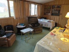 Rocker recliner, Glass and brass table . Laz-boy Rocker Recliner