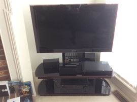 Large flat screen and stand. Samsung.