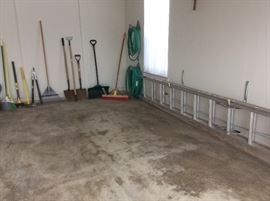 The garage is full of like new garden tools