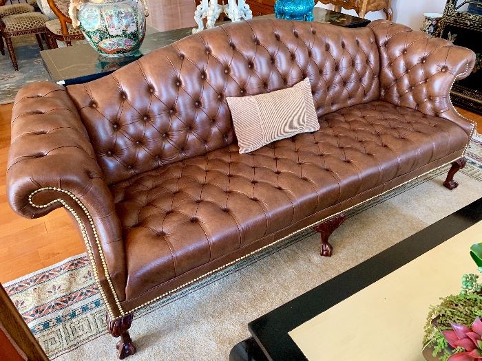Leather tufted camel back sofa from Leathercraft....like new!