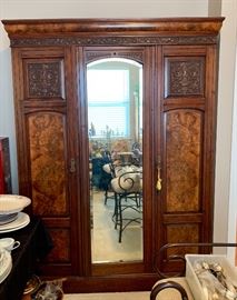 Stunning antique knockdown wardrobe marked A. Gardner and Sons with beveled glass