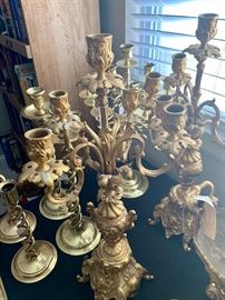 Brass candlesticks and candlabras