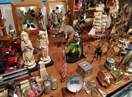 Assorted unique and collectible items....Robin ( heavy statue ) banks....Mickey and Minnie...ships....andmore