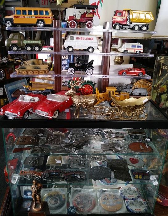 Assorted die cast cars....Assorted Belt buckles and NASA  buttons and other