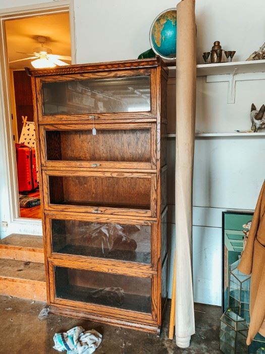 Tall lawyer bookcase, missing one glass piece. $50