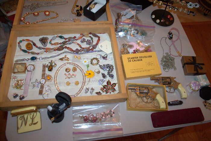 The starter revolvers have sold. We still have some costume jewelry left. (some of these items have sold)