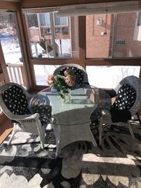 7 - PIECE WICKER ARMCHAIRS AND ROUND TABLE GLASS TOP