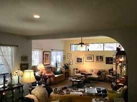 Sunken living room full art Lladros, art, pottery, Armani figures, jewelry etc