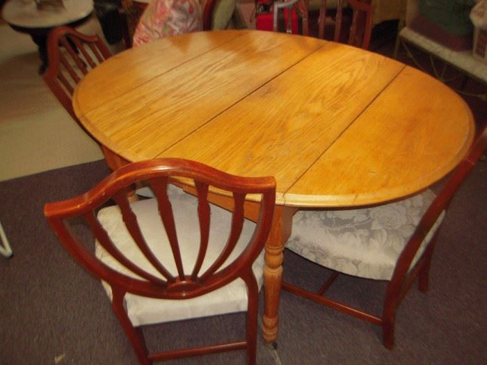 grated oak dropleaf table