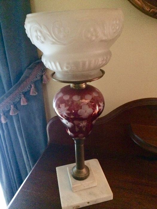 Antique oil lamp in cranberry glass....(not electrified)