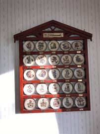 Hummel small plates in display case