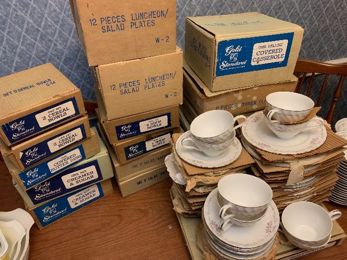 over 100 pieces of Gold Standard china