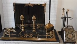 Brass fireplace rail, andirons, bed warmer, screen. Coal scuttle and fireplace tools.