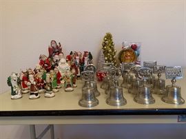 Christmas decorations, including  12 days of Christmas collectible bells and Santas of various sizes