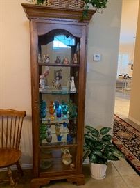 Ethan Allen curio with lighting and glass back