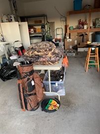 Hunting / outdoor gear, men's camo clothing, ladies golf clubs, more Garage stuff