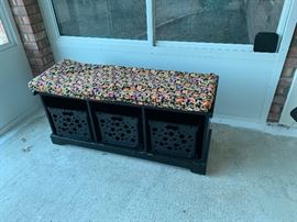 Bench with storage and covered cushion