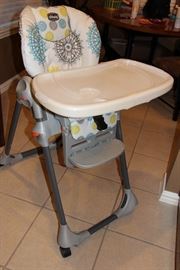 Chicco high chair folds all the way back and folds for storage!
