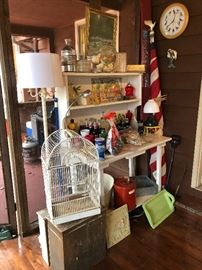 lamps, glass soda bottles, bird cage