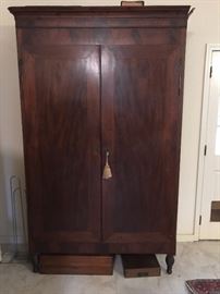 Louisiana Armoire with carved bee hive feet.  This is a rare Southern piece.