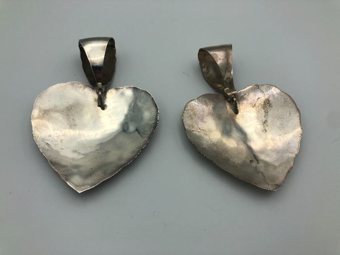 Item Number P95 (a&b).  Sterling Silver heart pendants. Each measures about 3 1/2" top to bottom. Interior of pendant marked "Mexico - 925". 