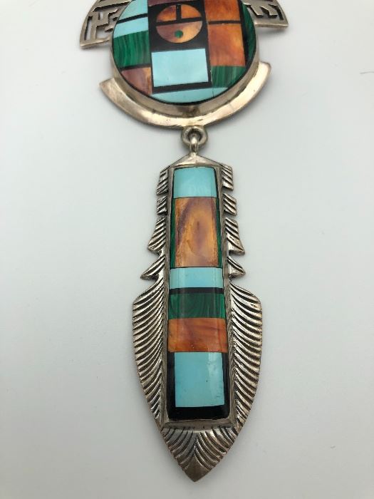 Item Number P97. Large Navajo sterling Pendant signed "Sterling Frank Yellowhorse".  Measures just over 5 1/2" long. 