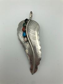 Item Number P49. Signed "Sterling". Navajo stone pin / pendant combination. Our client paid $80.