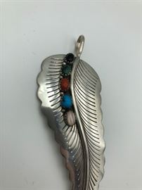 Item Number P49. Signed "Sterling". Navajo stone pin / pendant combination. Our client paid $80.