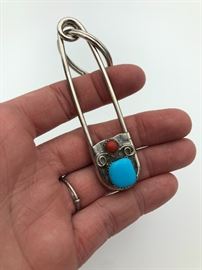 Item number M48. Large sterling silver safety pin. Pin measures 3 1/4" long. Keychain isn't sterling- just the pin. Sterling, turquoise and carnilian. 
