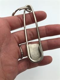 Item number M48. Large sterling silver safety pin. Pin measures 3 1/4" long. Keychain isn't sterling- just the pin. Sterling, turquoise and carnilian. 
