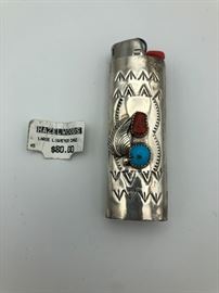 Item number M50. Sterling silver lighter cover with carnelian and turquoise. Signed "PB Sterling". Our client paid $80. 