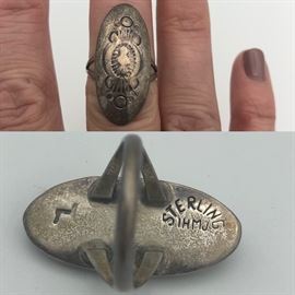 Item number R58. Sterling silver ring- size 5.5. Signed IHMJ. 