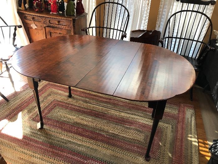 Hand Planed Tigers Eye Maple Dining Table with 2 leaves. By J. L. Treharn. Table is 43.5" wide 30" tall. 40" long with no leaves. 60" with both leaves in. Perfect condition.