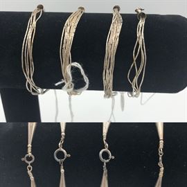 Item Number B64 A/B (10 strands- client paid $120 each) & B64 C/D (5 strands- client paid $60 each). Liquid sterling bracelets. 