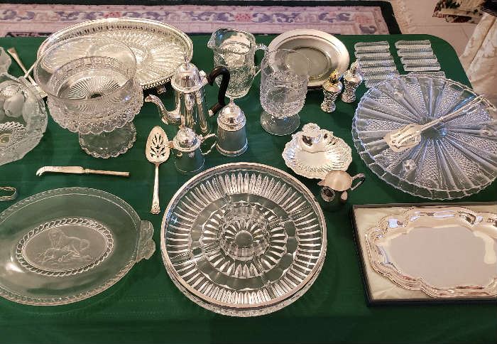 Serve your guest in style with this Beautiful Selection of Crystal & Silver Plate Serving Platters, Bowls, and Silverware.