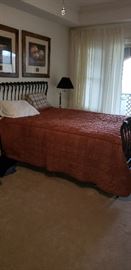 Stearns & Foster queen mattress set, black iron sleigh bed, lamp
