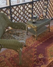 Wicker patio furniture, rug