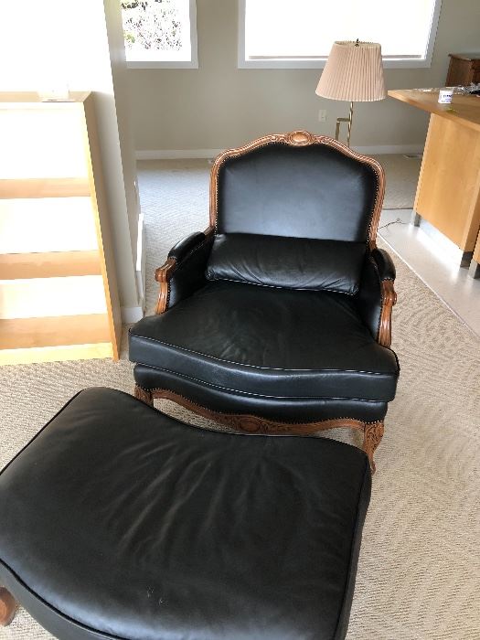 Black leather chair and ottoman