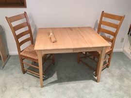 Wooden Table and Two Rattan Chairs