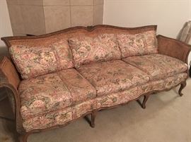 Sweet Antique Country French Cane Sofa with Carved Trim &
Completely Reupholstered Cushions