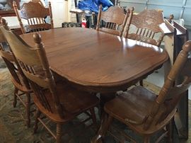 Oak Dining Room Set (seats up to 10) consisting of
Double Pedestal Table (2 Leaves) &
6 Beautifuy Carved Oak Chairs