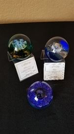 Caithness paperweights. Prices range from $30 (unlimited edition) to $40 (limted edition). Includes original boxes.