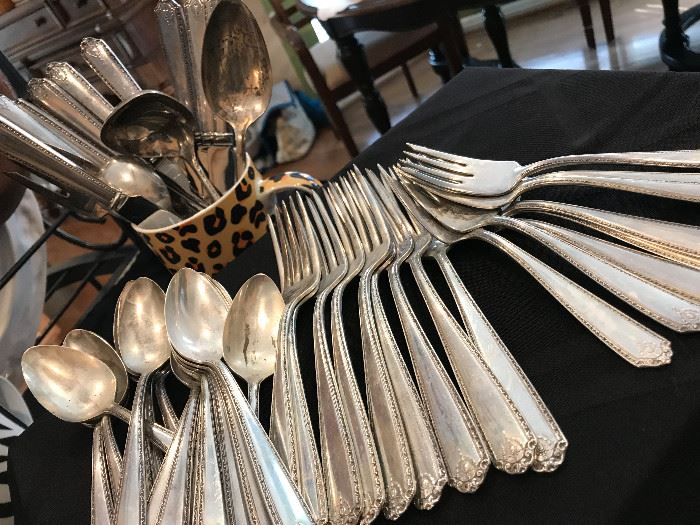 Westmorland "Lady Hilton" 47-piece set. $750
8 salad forks
9 dinner forks
9 knives
17 teaspoons
Sugar spoon
Gravy ladle
Serving spoon
Serving fork