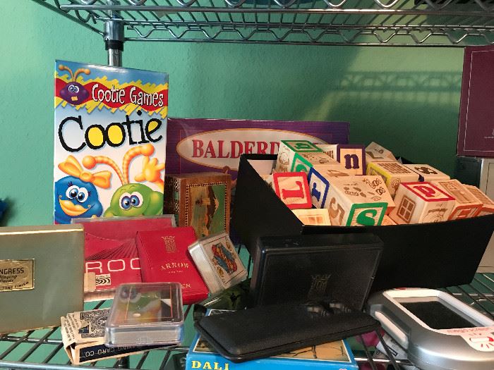 Cootie, building blocks, deck of cards