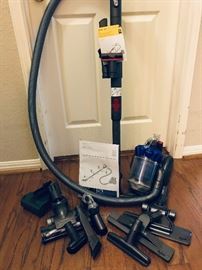 Dyson DC26 Multi Floor vacuum. Retails $600 ... estate sale price: $185