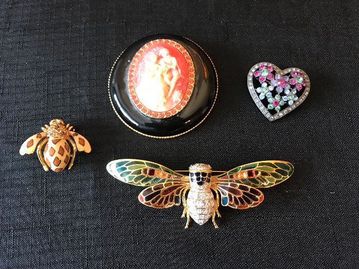 Joan Rivers brooches.