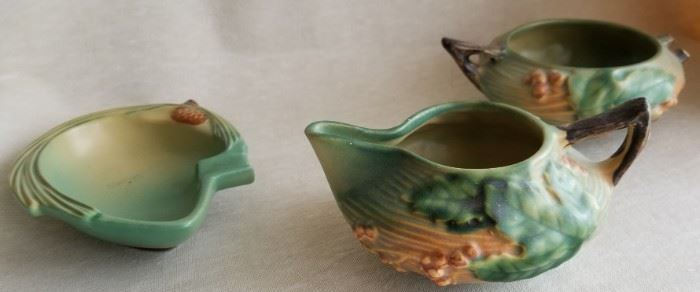 Roseville Pine Cone Ashtray
Roseville Bushberry Green creamer and sugar bowl. (Sugar bowl is missing a handle)